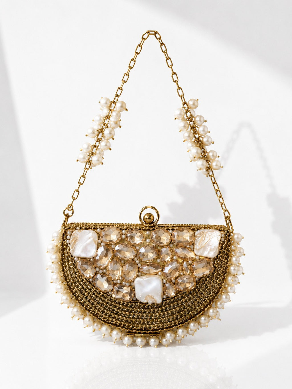 Pearl-Embellished Half-Moon Metal Potli - Zari and Zevar