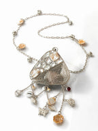 Pearl-Embellished Triangle Metal Potli - Zari and Zevar