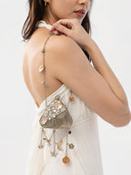 Pearl-Embellished Triangle Metal Potli - Zari and Zevar