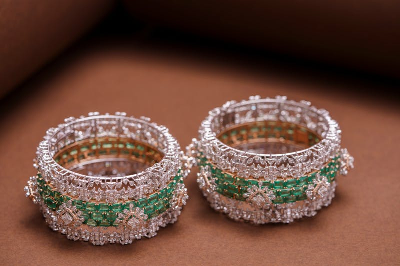 Pair of diamond and emerald bridal bangles