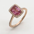 Pink sapphire halo ring in rose gold